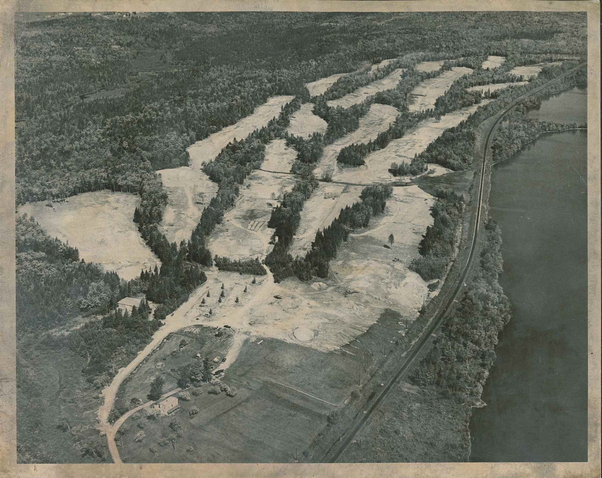 New-Course-Layout---in-progress-1968ish_An-aerial-view-of-a-golf-course-and-surrounding-landscape-As